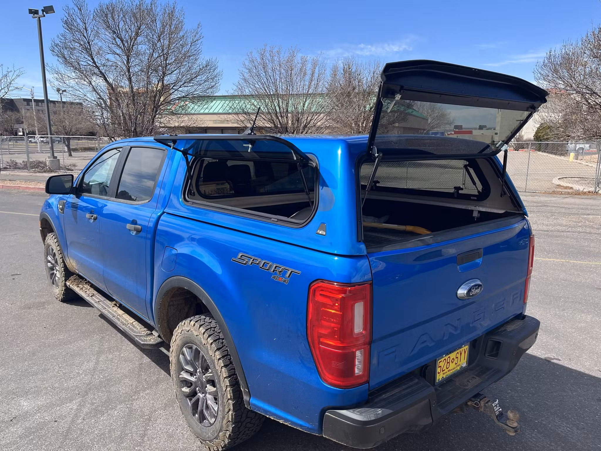 Image of a blue Ford Ranger with a car topper in Albuquerque
