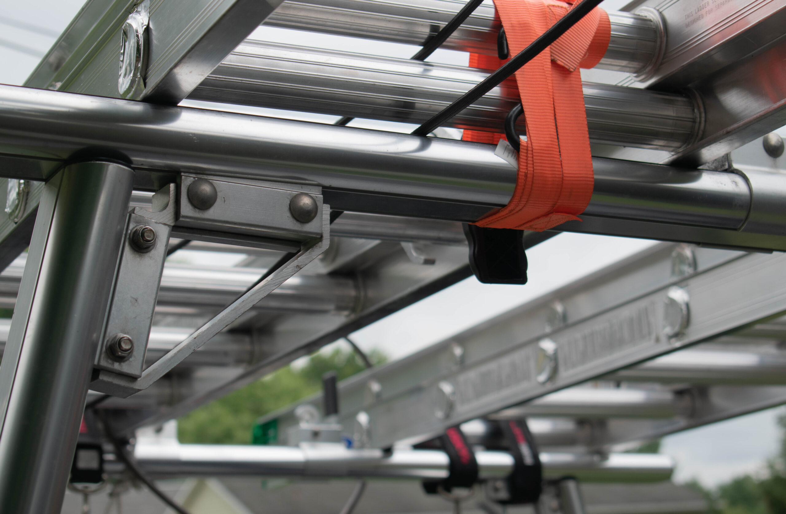 Image of a red Ford with nerf bars installed in Albuquerque