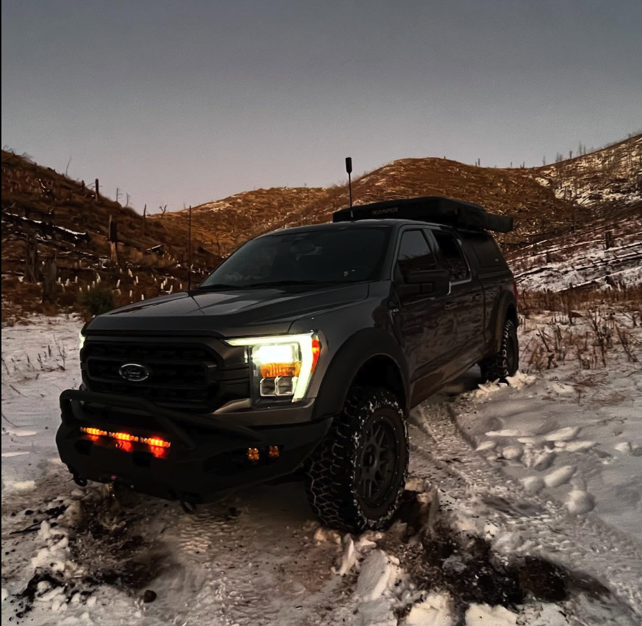 Image of a Ford 4x4 vehicle off-roading in the snow