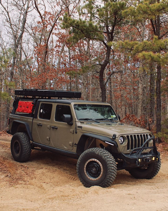 Image of an outfitted Jeep off-roading