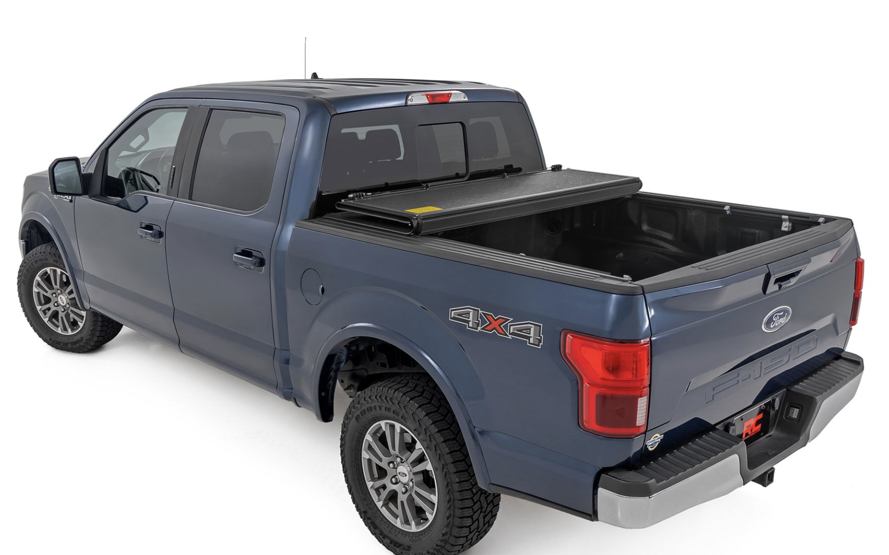Image of Toyota Tundra with a folding bed cover to protect against the weather